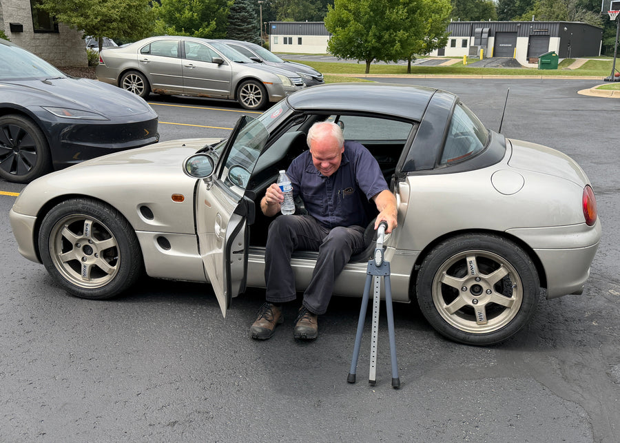 Older adult preparing to enter a passenger vehicle